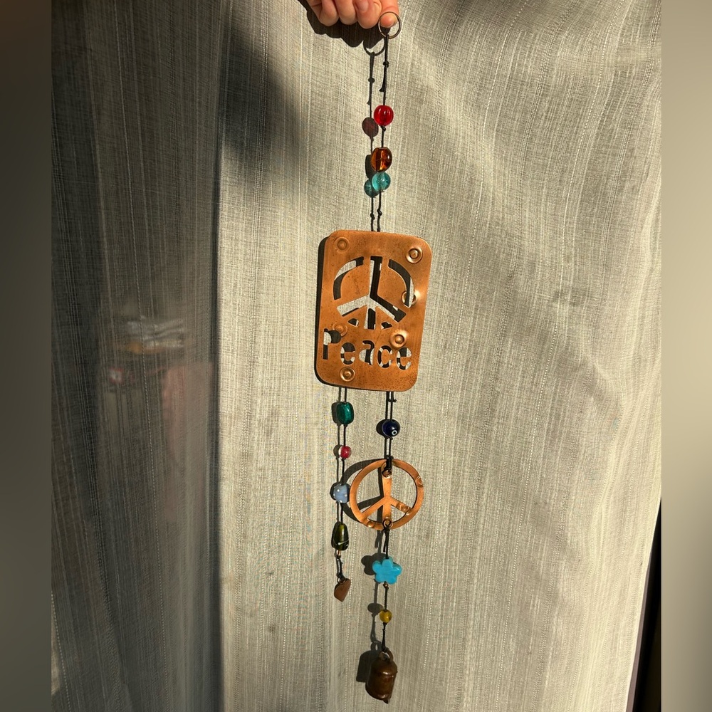 one of a kind peace wind chime